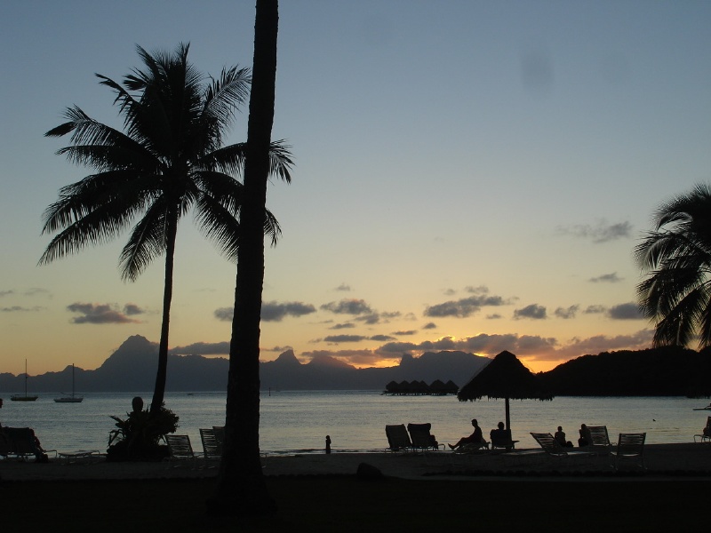 Tahitian sunset with Moorea in the background.