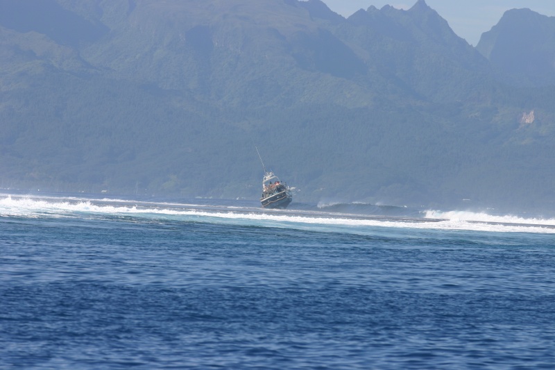 Exiting the Passe Paipai, a boat wrecked upon the reef. 