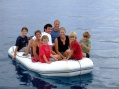 The happy crew of Elstes and Martins. How many people is that dinghy rated for?